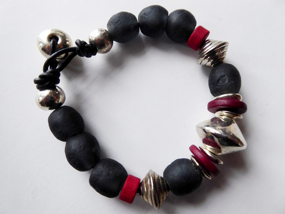 Black ceramic bead, silver and red bangle – Tower House Gallery